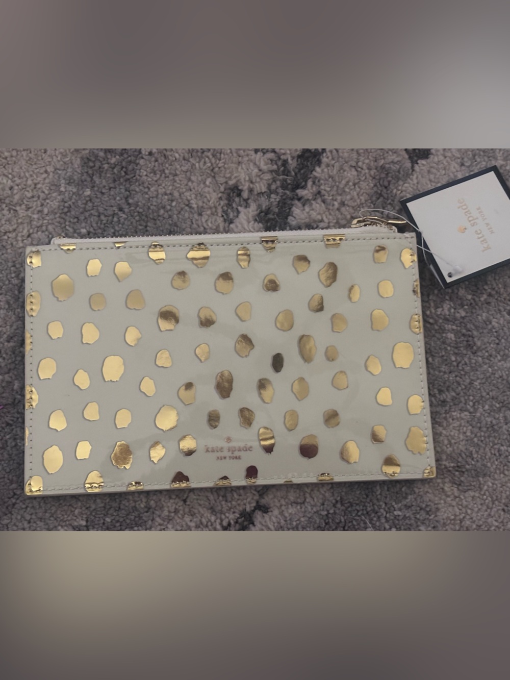 kate spade White Wristlet with Gold Spot Print